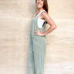 sage green jumpsuit, relaxed comfy, spaghetti straps, v neckline, oversized relaxed