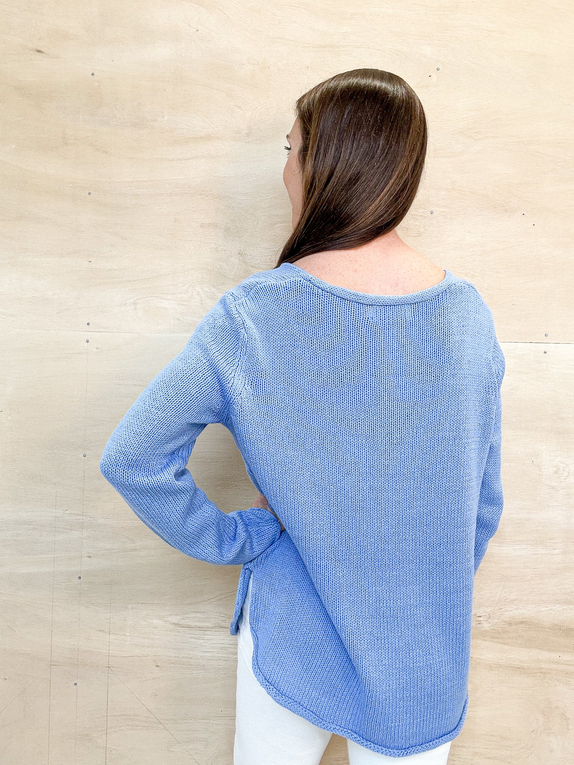 blue beach sweater, round neckline, white text, lightweight sweater