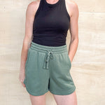green sweat shorts, with a elastic wasitband, pockets