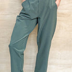 green stretch pants, thick waistband, pockets, waffle material, 