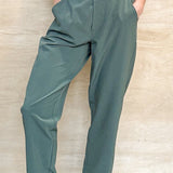 green stretch pants, thick waistband, pockets, waffle material, 