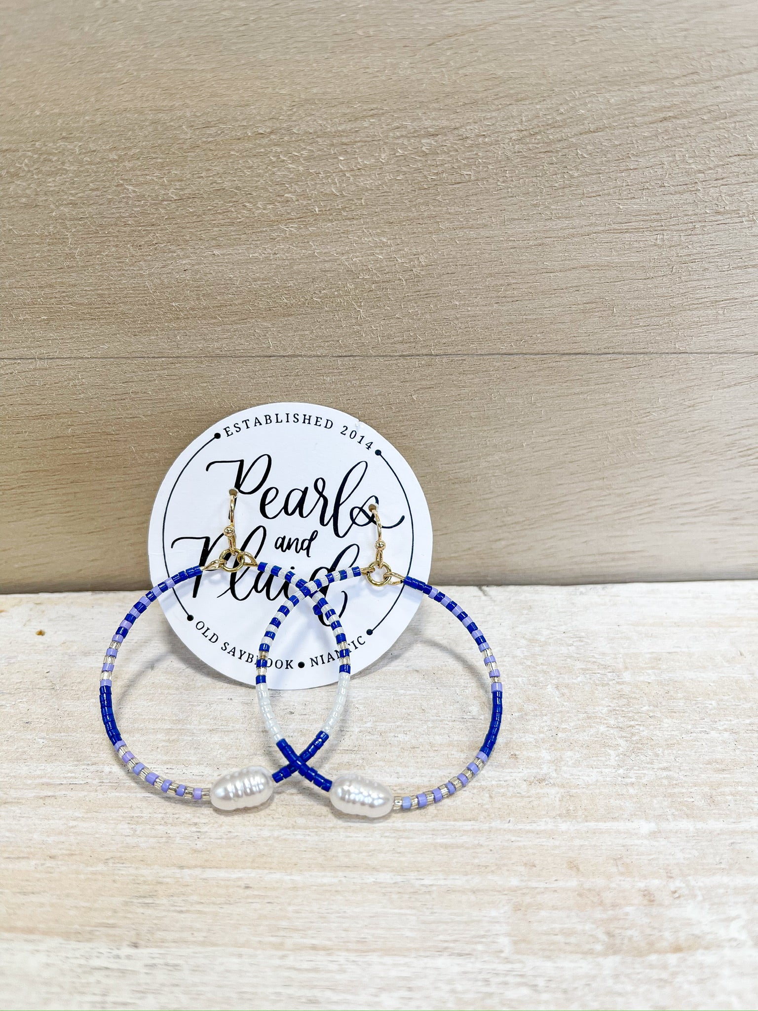 blue beaded hoop earrings, pearl accent